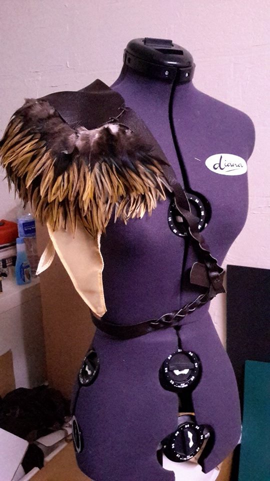 A picture of my shoulder piece and some of the belts created for the costume.