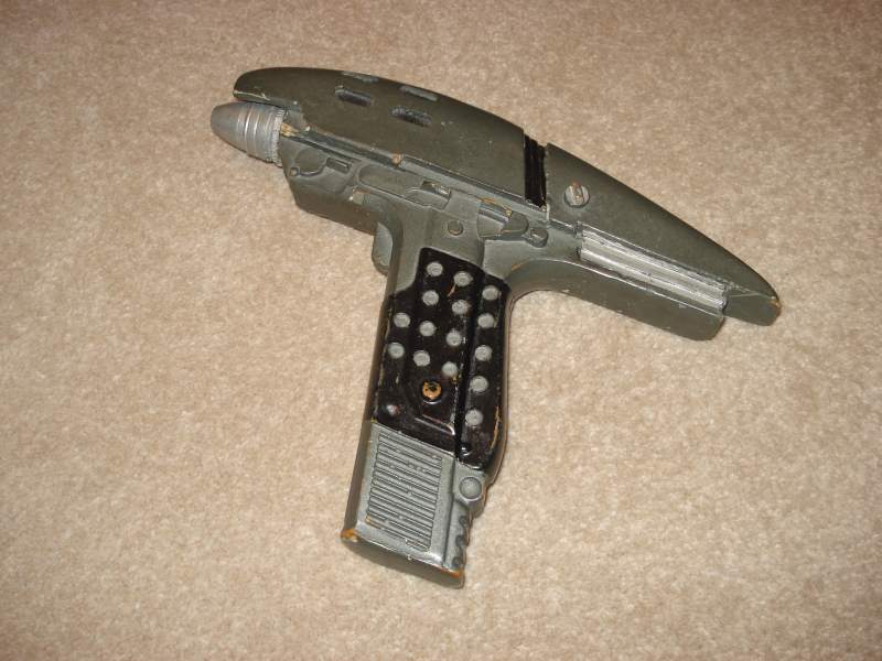 I obtained this copy of a Star Trek:VI Assault Phaser many many years ago. I believe the colour scheme to be way off. I think in time I may start a fr