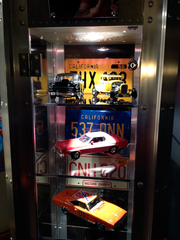 Oakley display with replica movie/TV cars