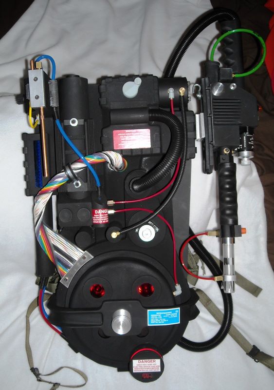 Photo of my most recent Proton Pack build. Full lights and sound. Handmade  ribbon cable. CNC machined shock mount.