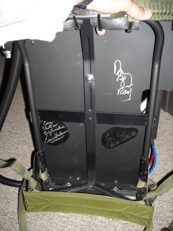 Proton Pack is autographed by Dan Aykroyd, Ernie Hudson, and William Atherton.