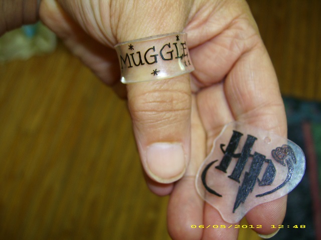 shrink plastic "Muggle" ring and "HP" tag