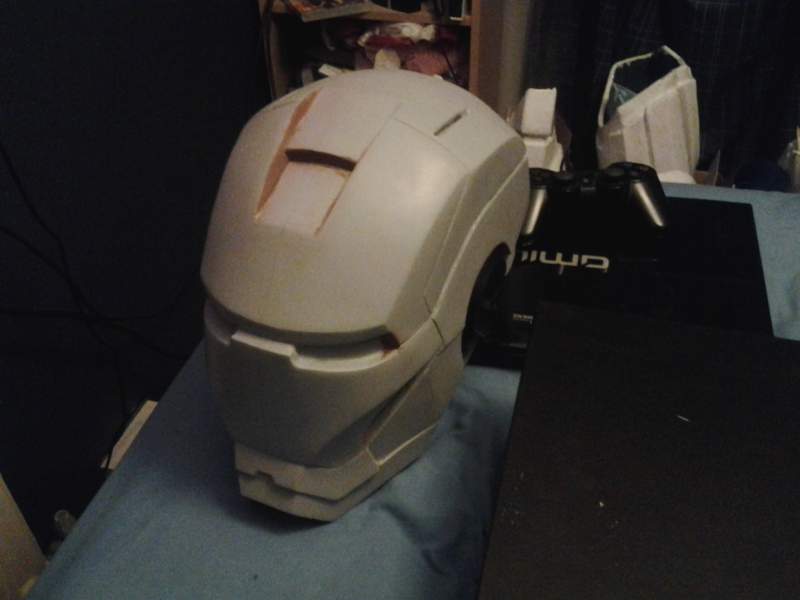 The foam cardboard helmet coated in resin and some body filler after hours of sanding now ready for silicone moulding.